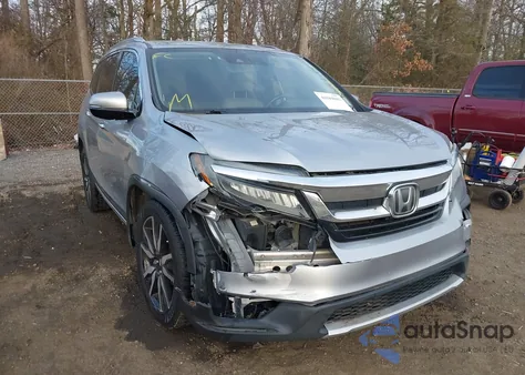 2019 Honda Pilot Touring z USA, uszkodzony, nr VIN 5FNYF5H92KB025374